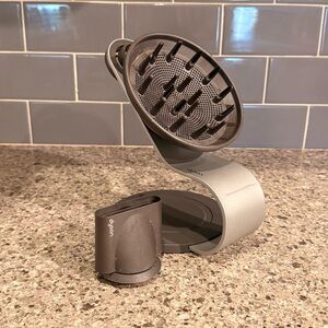 Dyson Supersonic hair dryer stand with attachments